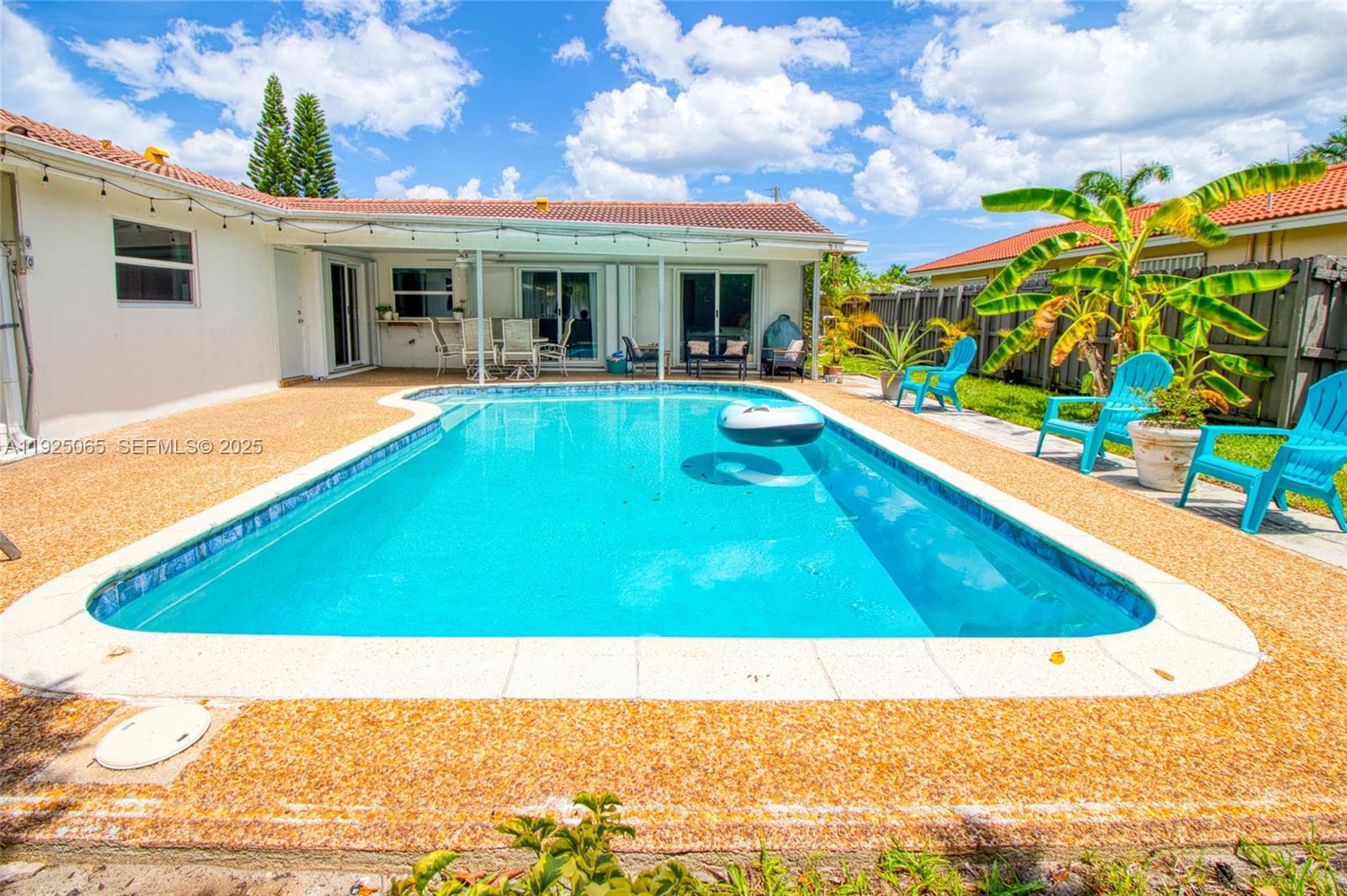 107 Winged Foot Lane Boca Raton, FL 33431 - Photo 40 of 46 a view of a house with swimming pool