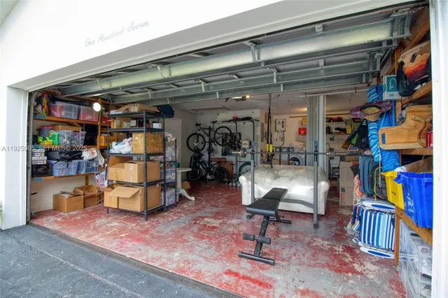 a view of living room with a table and chairs
