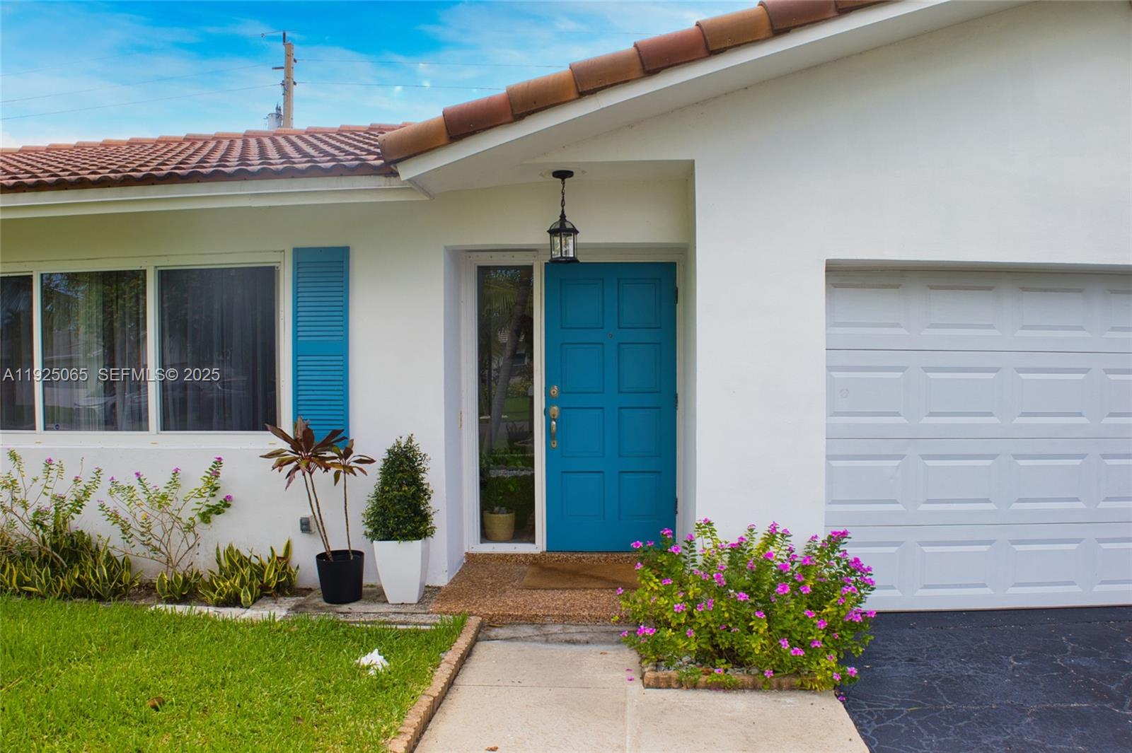 107 Winged Foot Lane Boca Raton, FL 33431 - Photo 6 of 46 a front view of a house