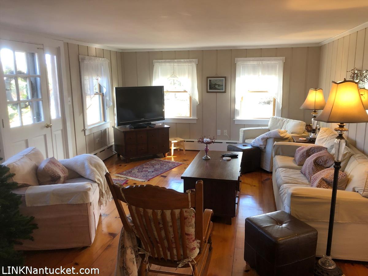 8 M Street Nantucket, MA 02554 - Photo 5 of 20 a living room with furniture and a flat screen tv