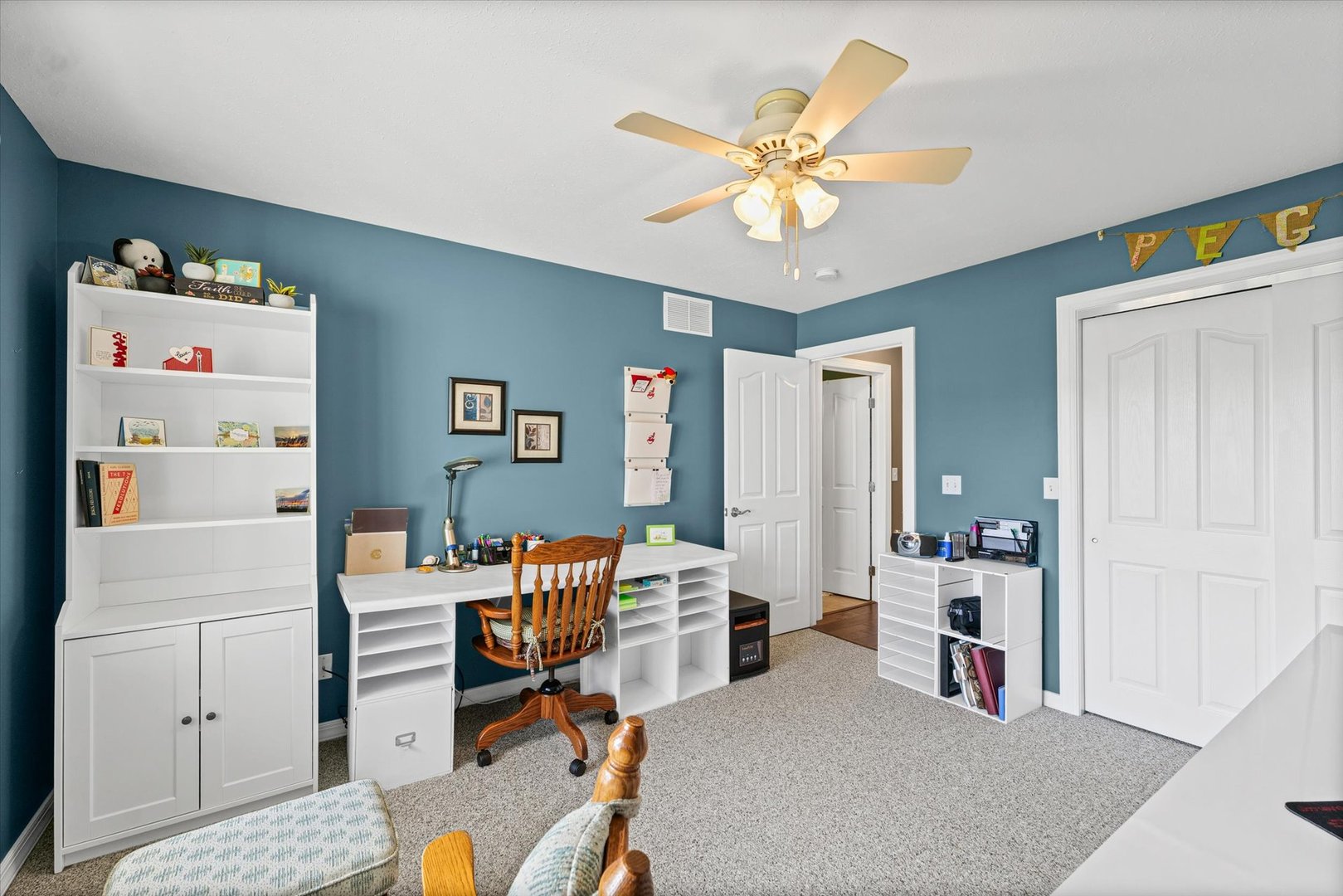 2523 Windward Boulevard, Unit 2523 Champaign, IL 61821 - Photo 17 of 26 a workspace with furniture and window