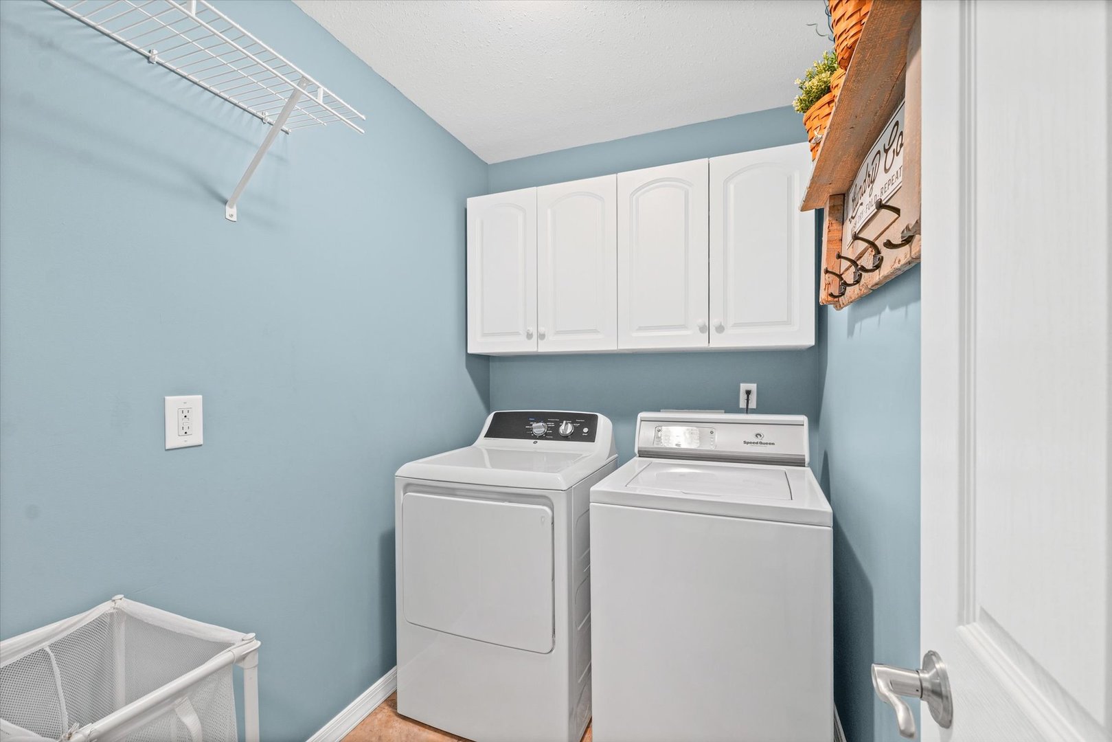 2523 Windward Boulevard, Unit 2523 Champaign, IL 61821 - Photo 21 of 26 a utility room with dryer and washer