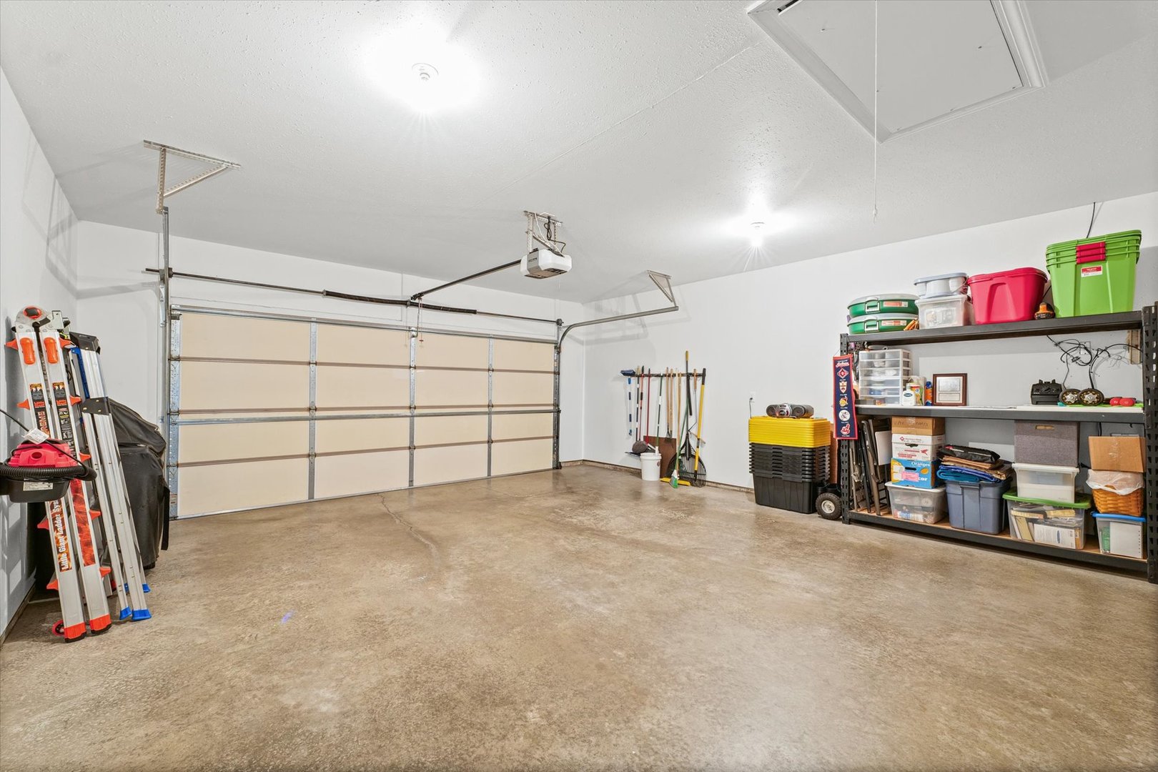 2523 Windward Boulevard, Unit 2523 Champaign, IL 61821 - Photo 22 of 26 a view of a garage with storage