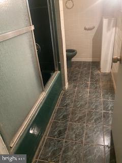 722 Shepherd Street Northwest Washington, DC 20011 - Photo 3 of 25 Spacious bathroom with modern tiles.
