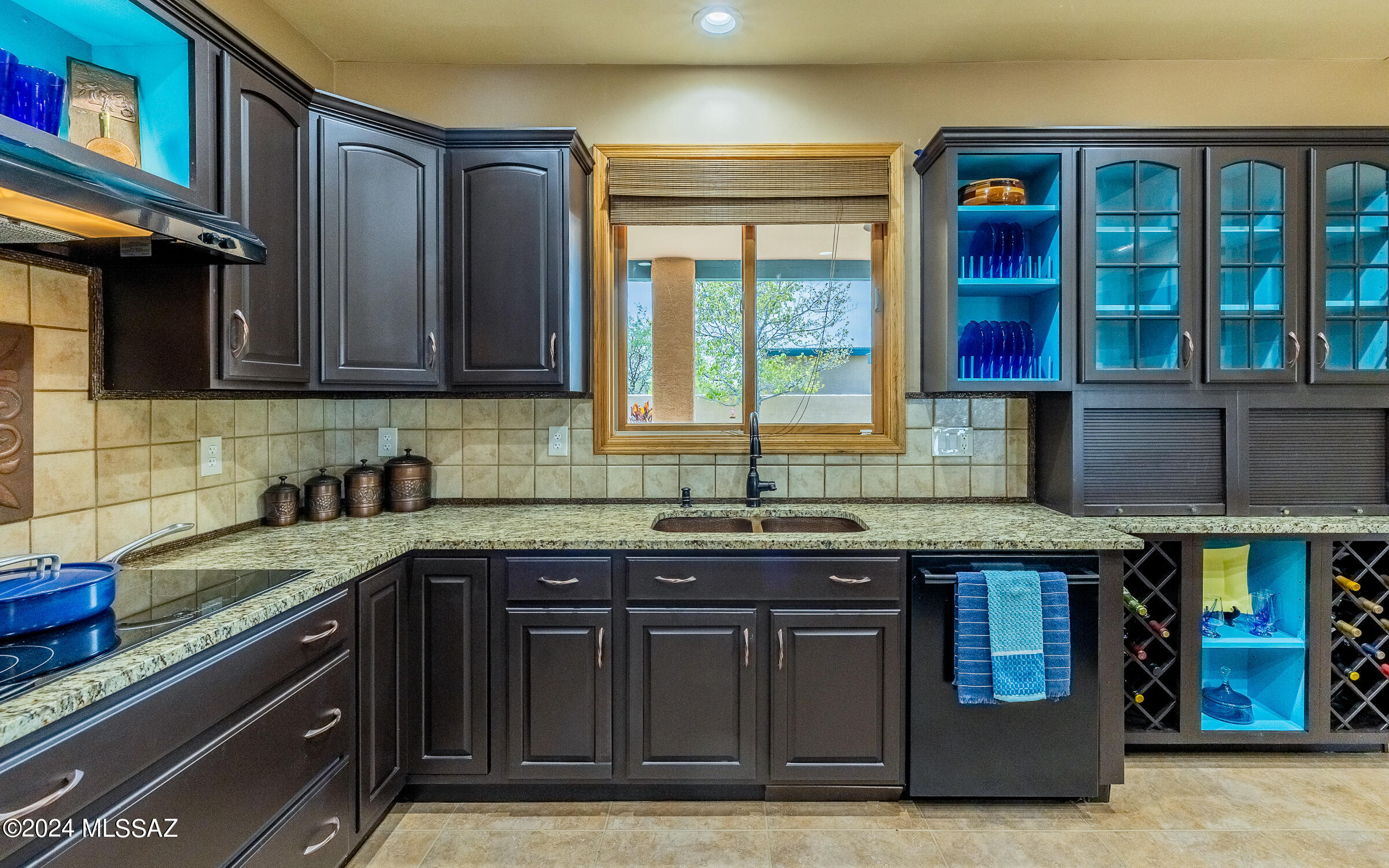 341 Sharon Road Vail, AZ 85641 - Photo 11 of 50 a kitchen with stainless steel appliances granite countertop a sink and cabinets