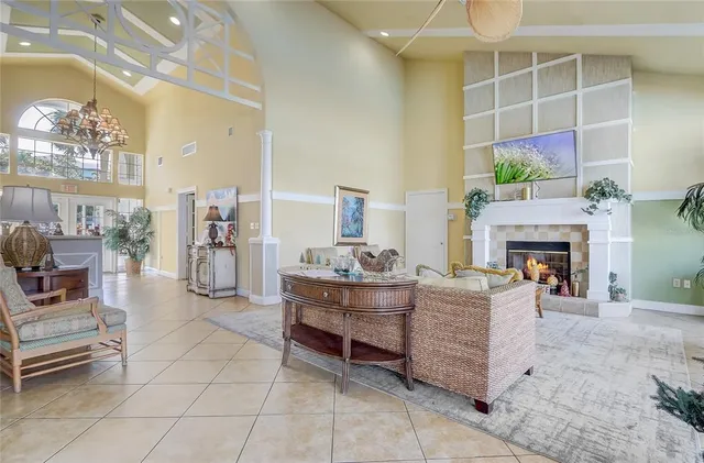 front view of a house with swimming pool and sitting area