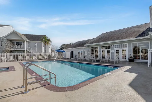 a view of a house with swimming pool
