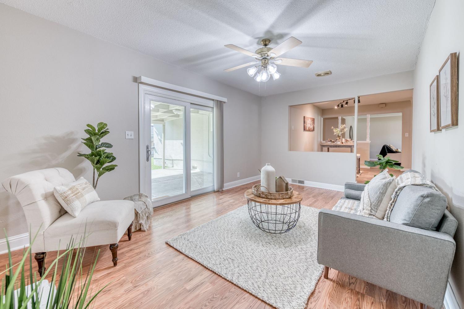 638 West Dennis Drive Clovis, CA 93612 - Photo 18 of 33 a living room with furniture and wooden floor