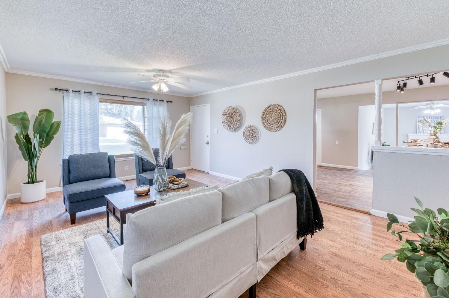 638 West Dennis Drive Clovis, CA 93612 - Photo 9 of 33 a living room with furniture and a large window