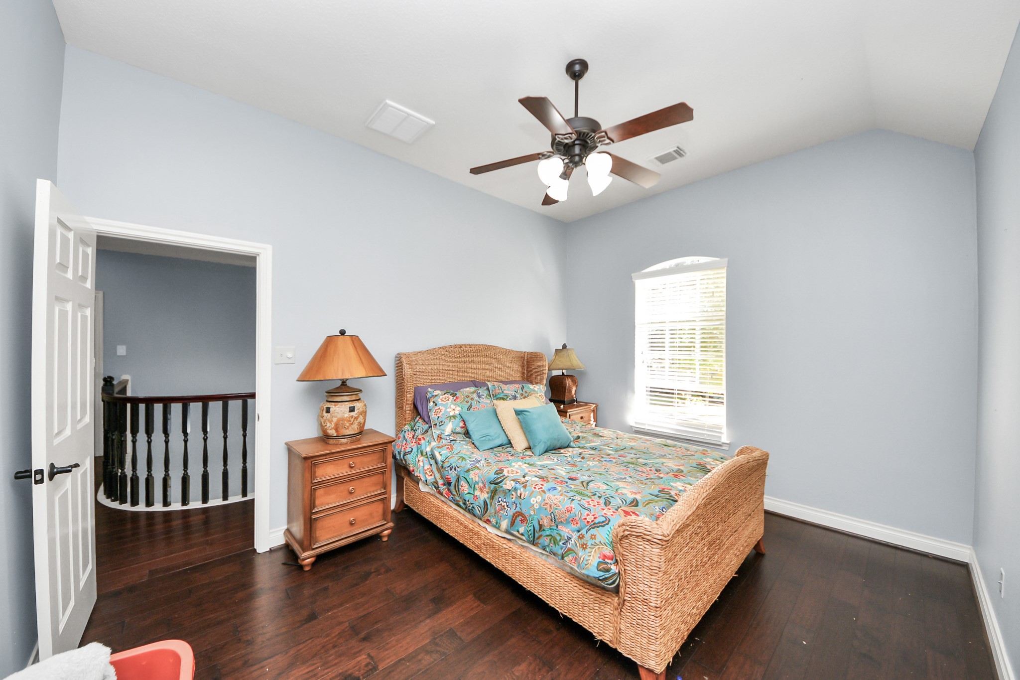 22010 Castlewind Court Katy, TX 77450 - Photo 30 of 41 a bedroom with a bed and window