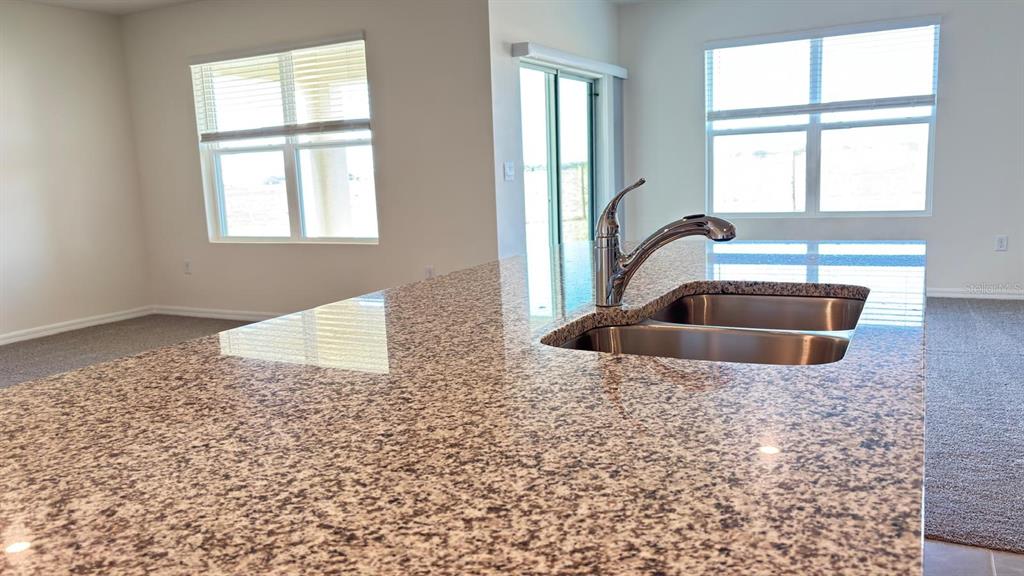 914 Princess Sabal Point Haines City, FL 33844 - Photo 12 of 39 a living room with a couch