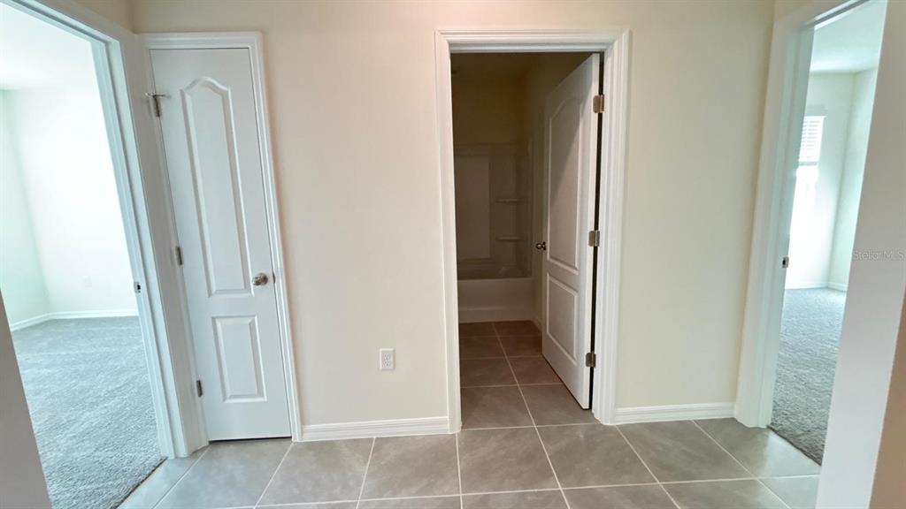 914 Princess Sabal Point Haines City, FL 33844 - Photo 13 of 39 a view of a elevator and an empty room