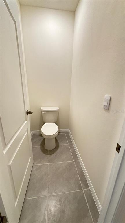 914 Princess Sabal Point Haines City, FL 33844 - Photo 25 of 39 a bathroom with a toilet and a shower