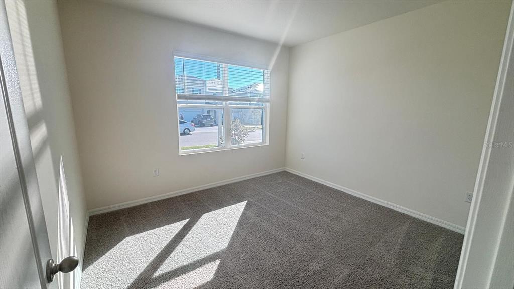 914 Princess Sabal Point Haines City, FL 33844 - Photo 34 of 39 an empty room with windows