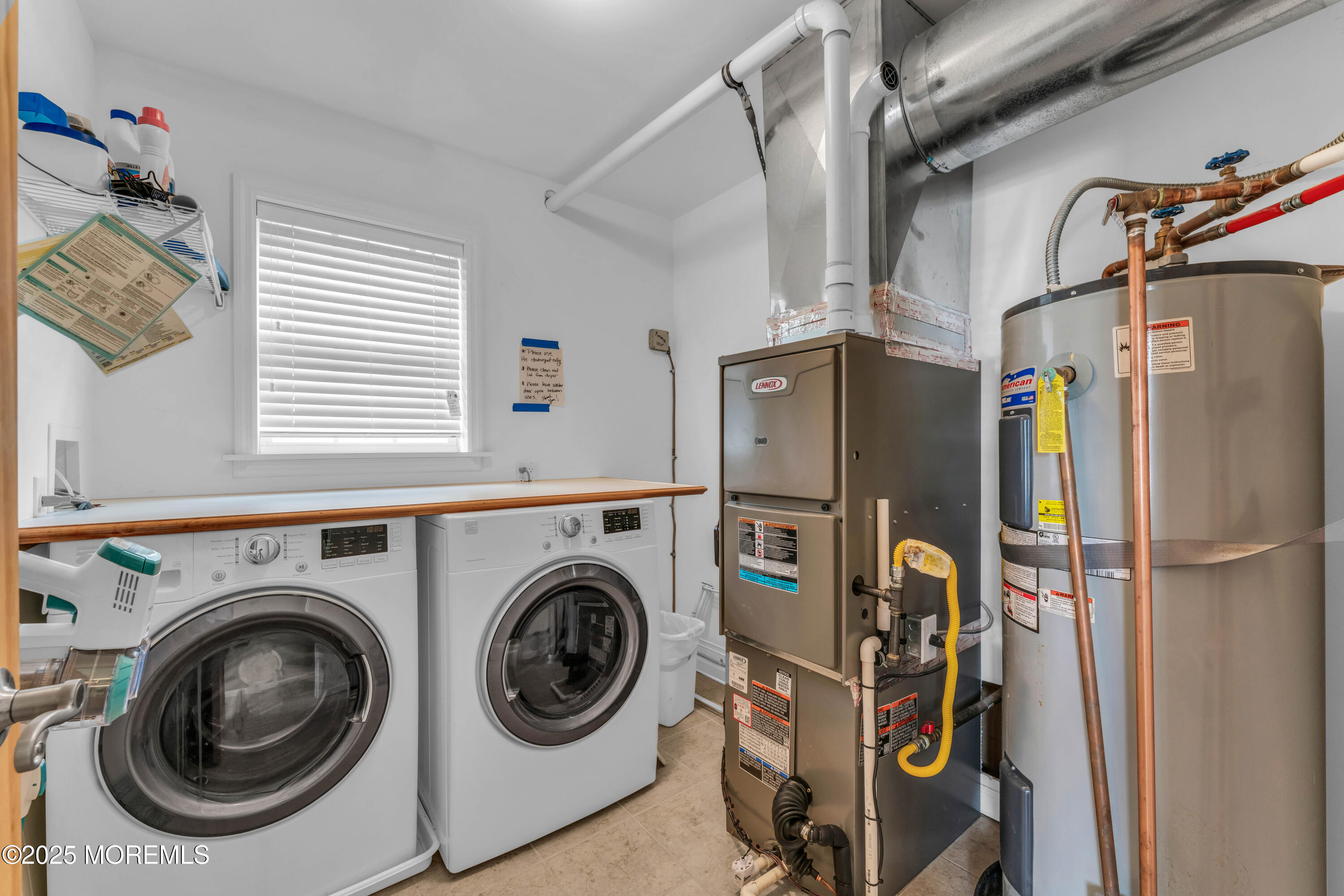 111 7th Avenue Seaside Park, NJ 08752 - Photo 16 of 46 a utility room with dryer and washer