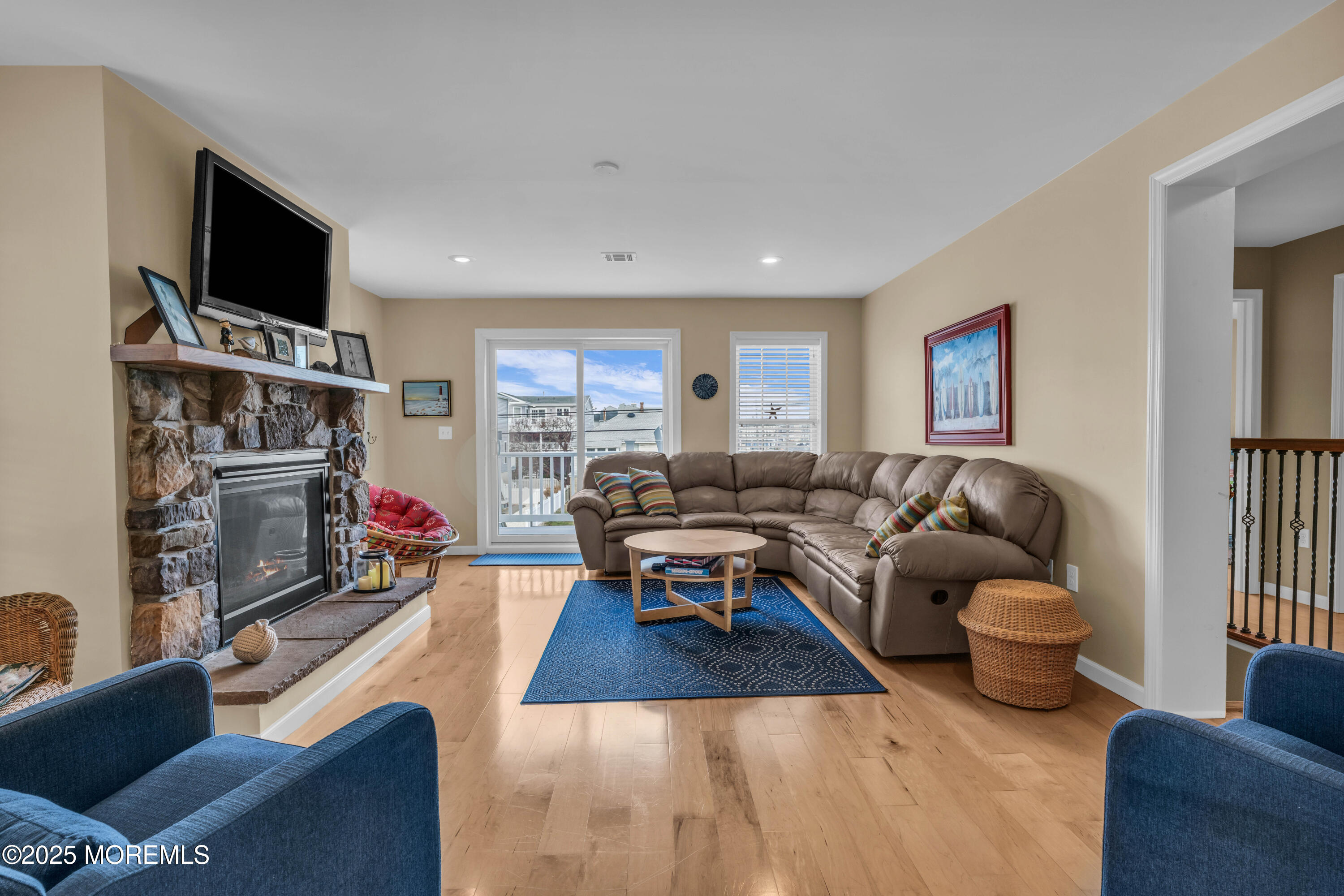 111 7th Avenue Seaside Park, NJ 08752 - Photo 27 of 46 a living room with furniture and a flat screen tv