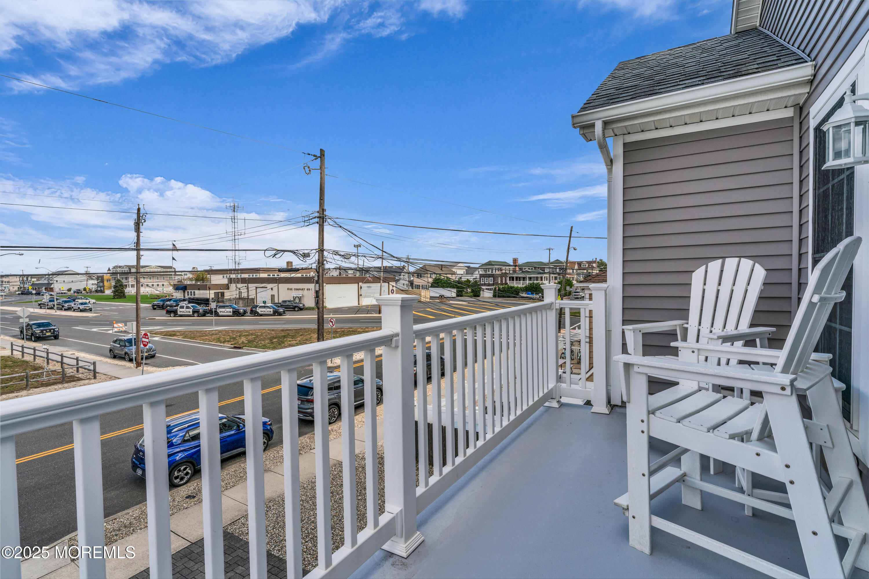 111 7th Avenue Seaside Park, NJ 08752 - Photo 28 of 46 a view of a balcony with wooden chairs