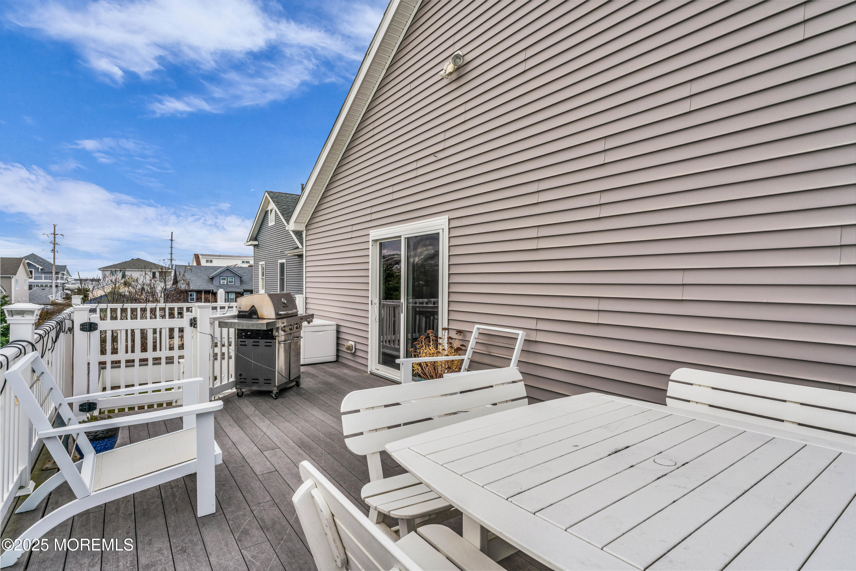 111 7th Avenue Seaside Park, NJ 08752 - Photo 41 of 46 a view of a balcony with chairs