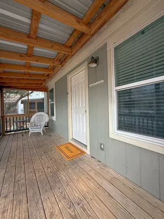 a view of a living room and wooden floor