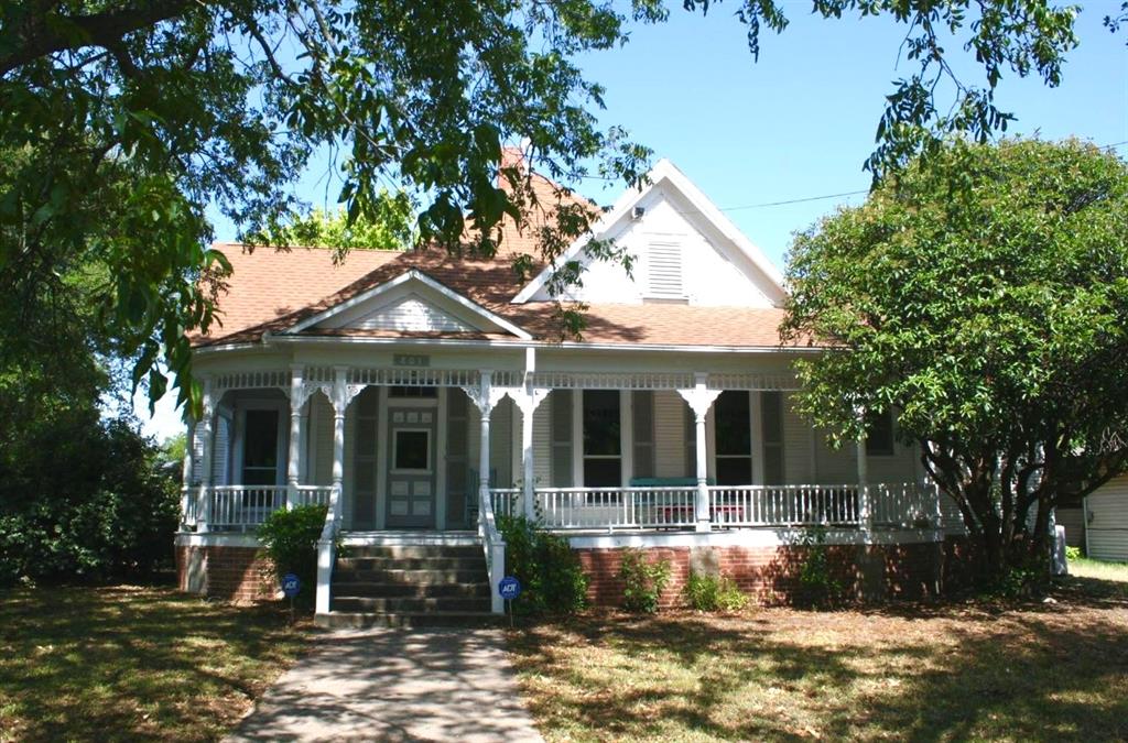 a front view of a house with porch