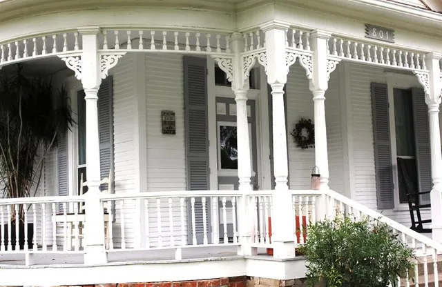 a front view of a house with a garage