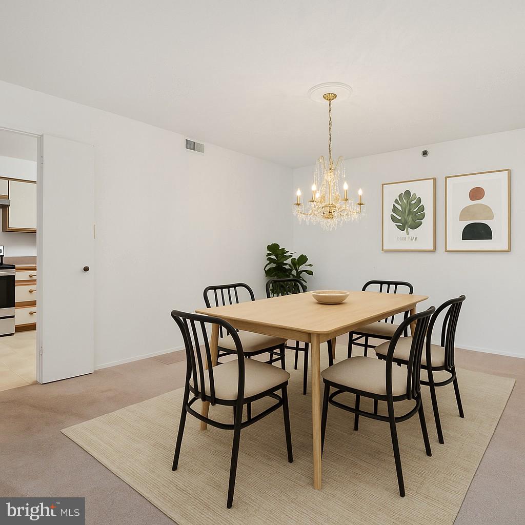 15115 Interlachen Drive, Unit 3815 Silver Spring, MD 20906 - Photo 4 of 22 a dining room with furniture and chandelier