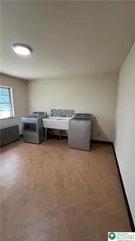 a storage room with furniture and window