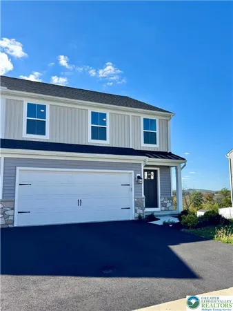 a view of a house with a garage