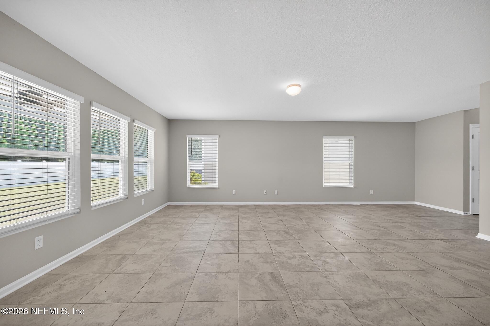 4818 Morning Rise Circle Jacksonville, FL 32218 - Photo 13 of 33 08_4818_Morning_Rise_Cir-Living_room-847