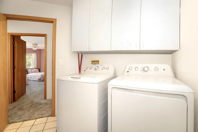 a view of a tennis court with basket ball court