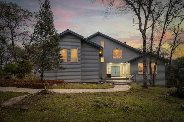 a backyard of a house with lots of green space