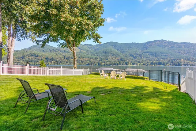 a view of a swimming pool with a lounge chairs