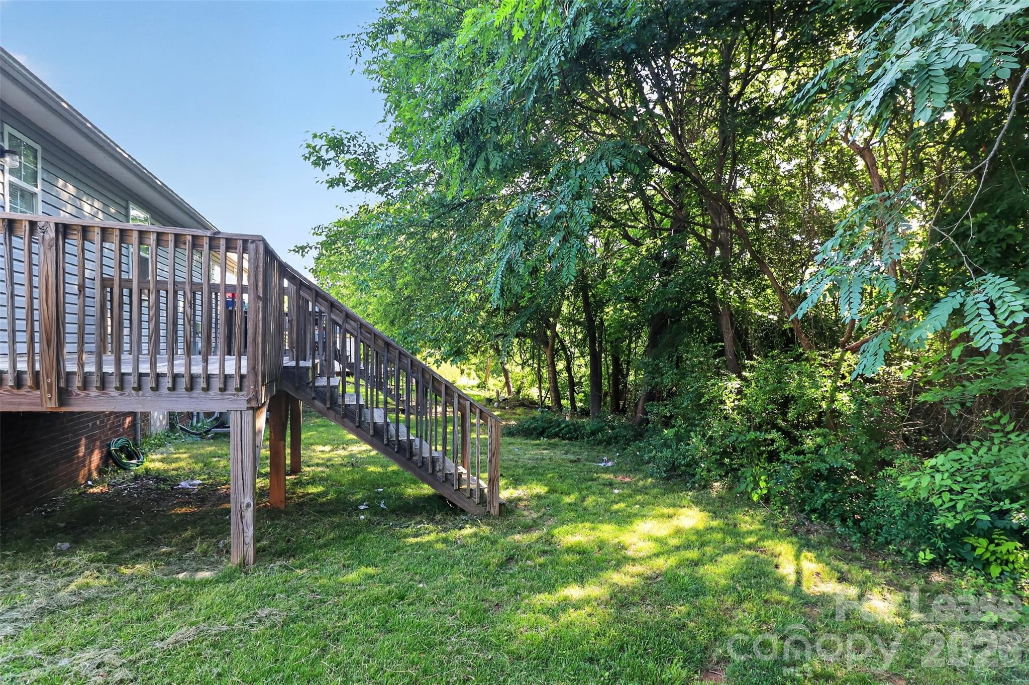 91-93 Sunderland Road Southwest, Unit 93 Concord, NC 28027 - Photo 26 of 30 a view of a house with a yard