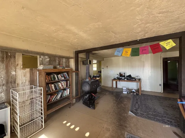 a view of a chairs and table in a room