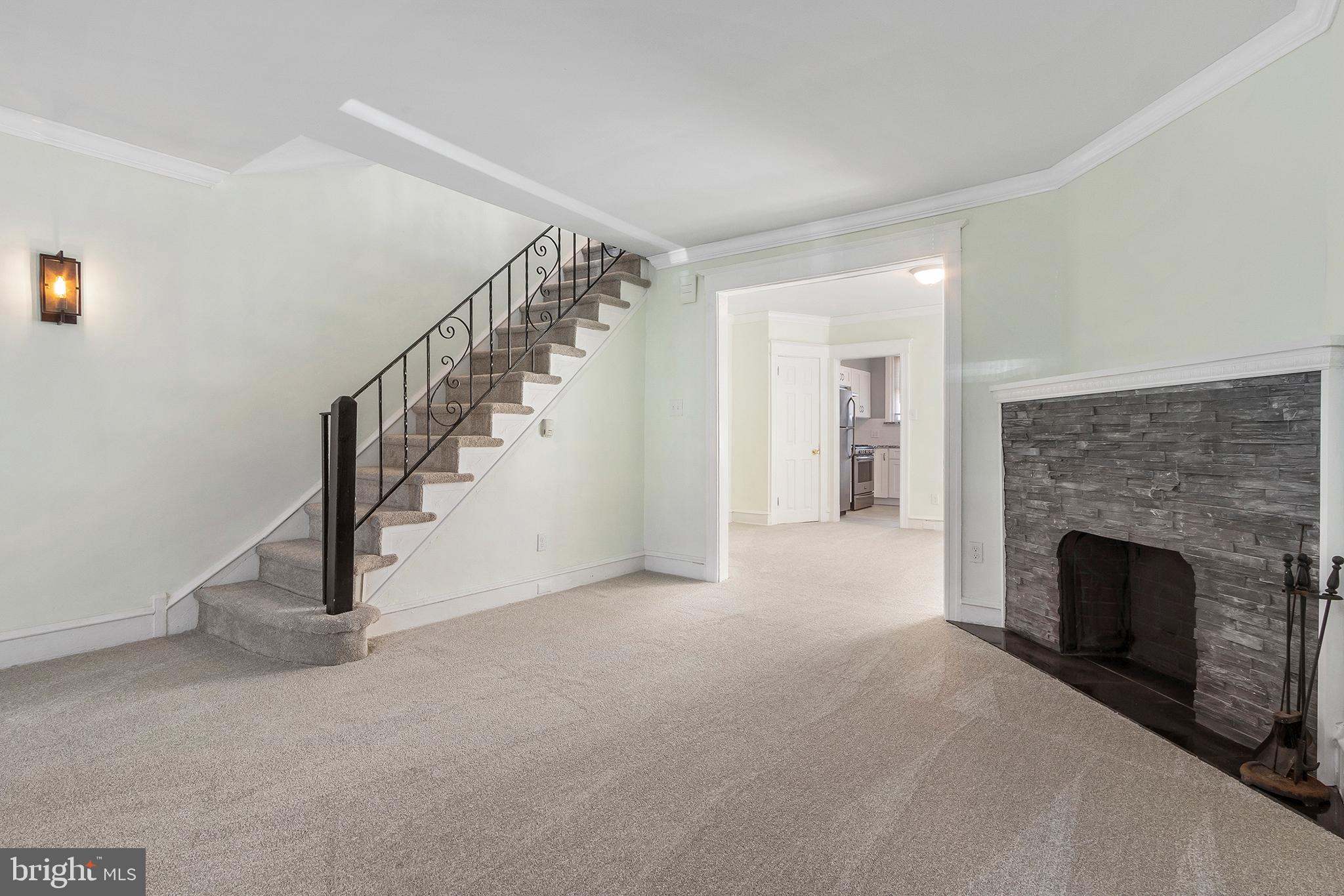 7322 Sommers Road Philadelphia, PA 19138 - Photo 3 of 25 Living room w/faux fireplace
