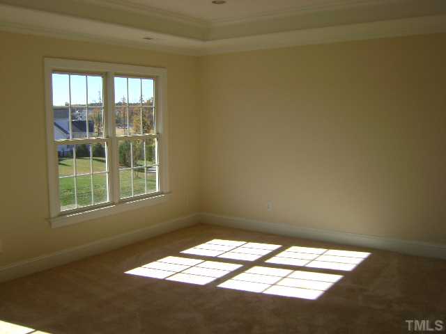 305 Waterville Street Raleigh, NC 27603 - Photo 6 of 8 an empty room with a window