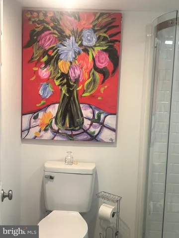 a bathroom with a toilet and sink