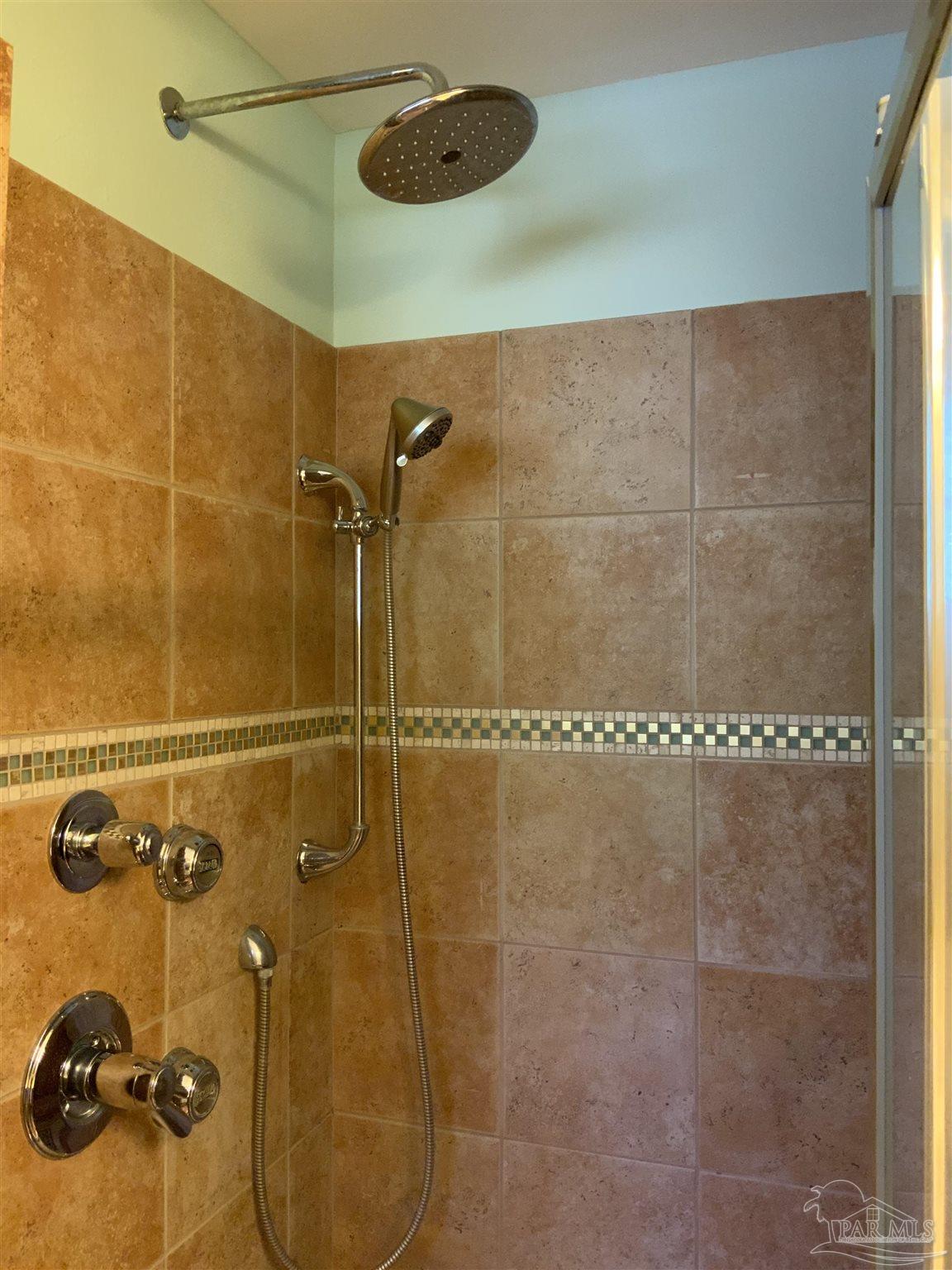 4867 Aleff Road Pace, FL 32571 - Photo 38 of 41 a bathroom with a shower