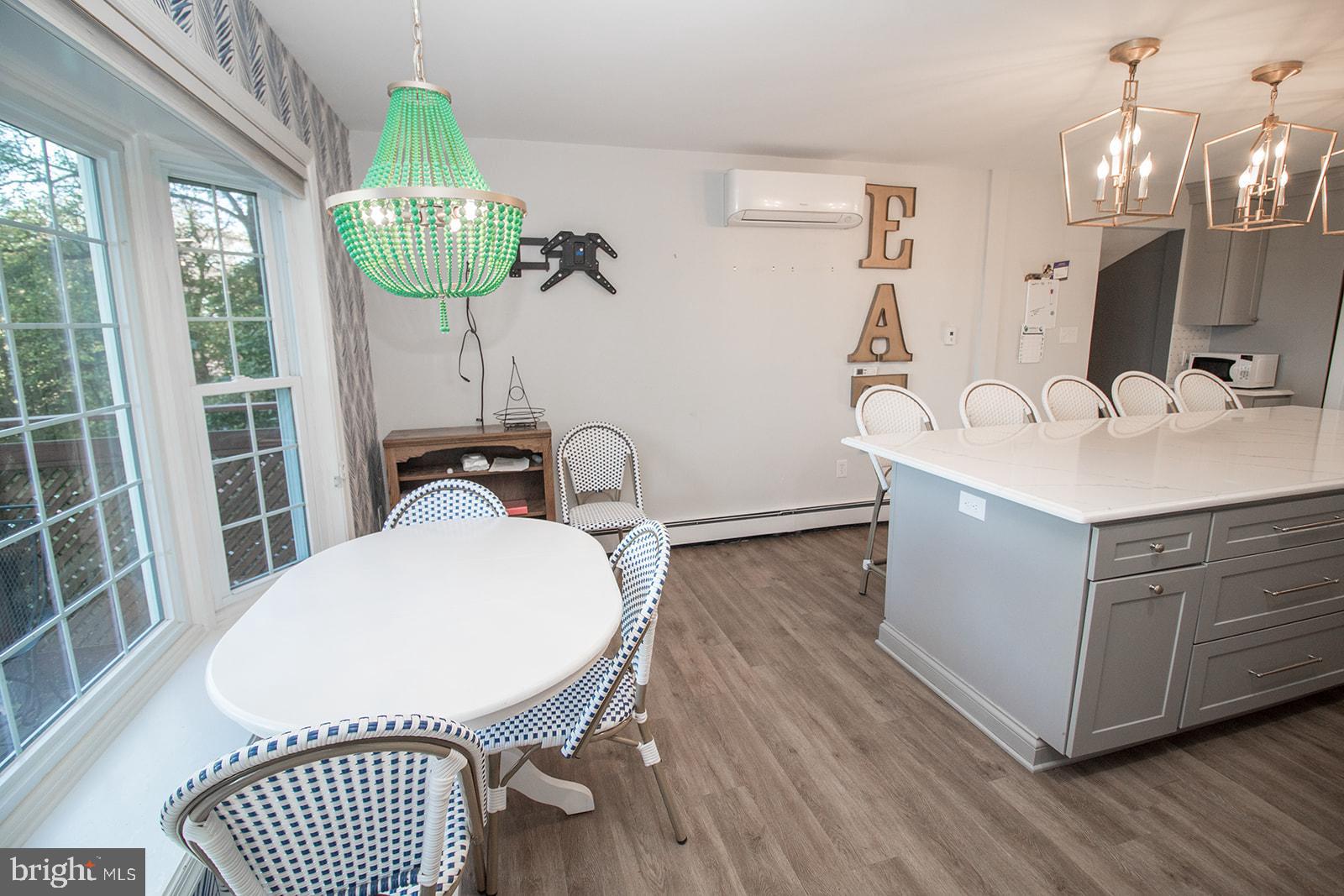 8120 Chapel Point Road Port Tobacco, MD 20677 - Photo 25 of 95 a en suite bathroom with a sink a mirror and a toilet
