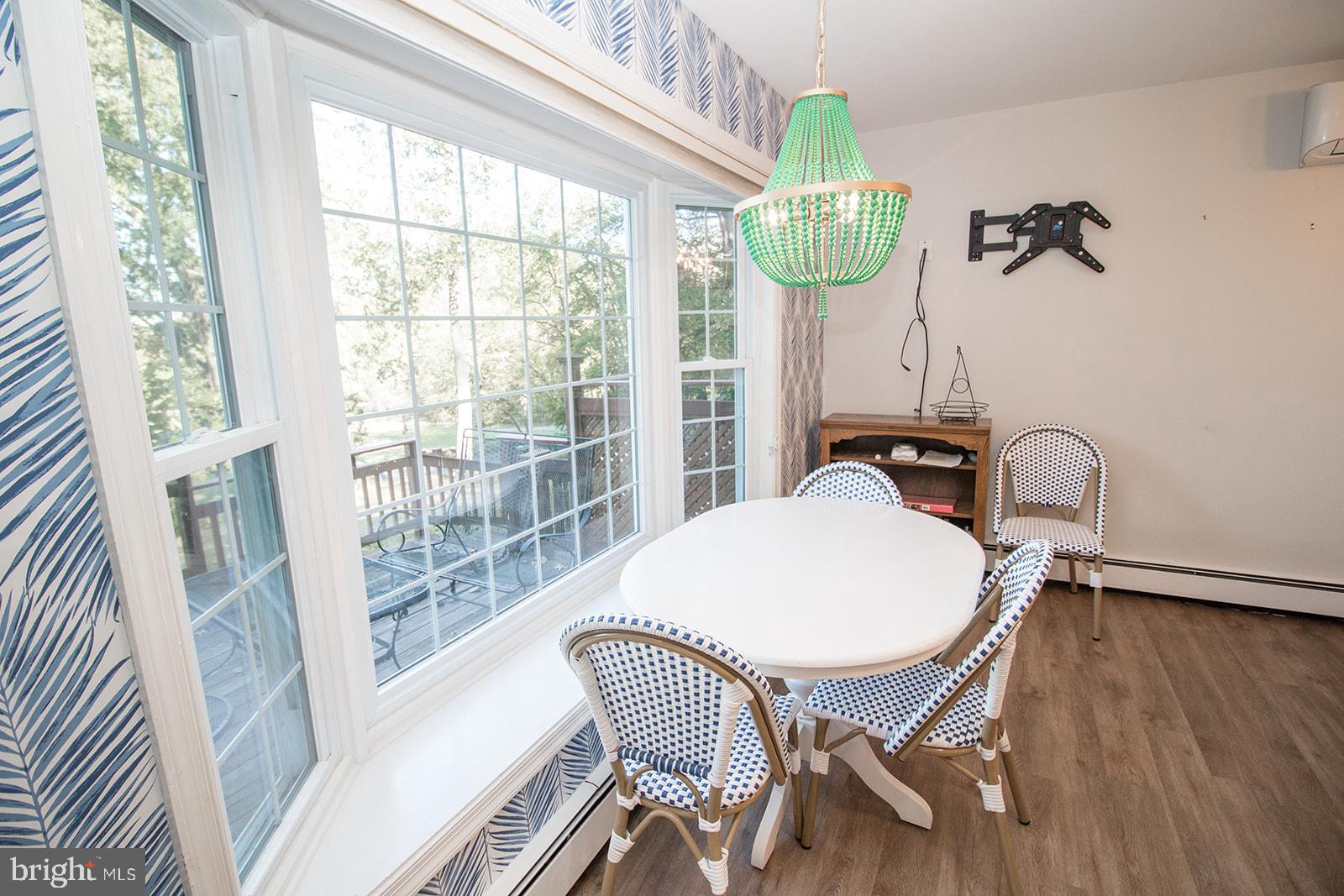8120 Chapel Point Road Port Tobacco, MD 20677 - Photo 26 of 95 a view of a dining room with furniture window and outside view
