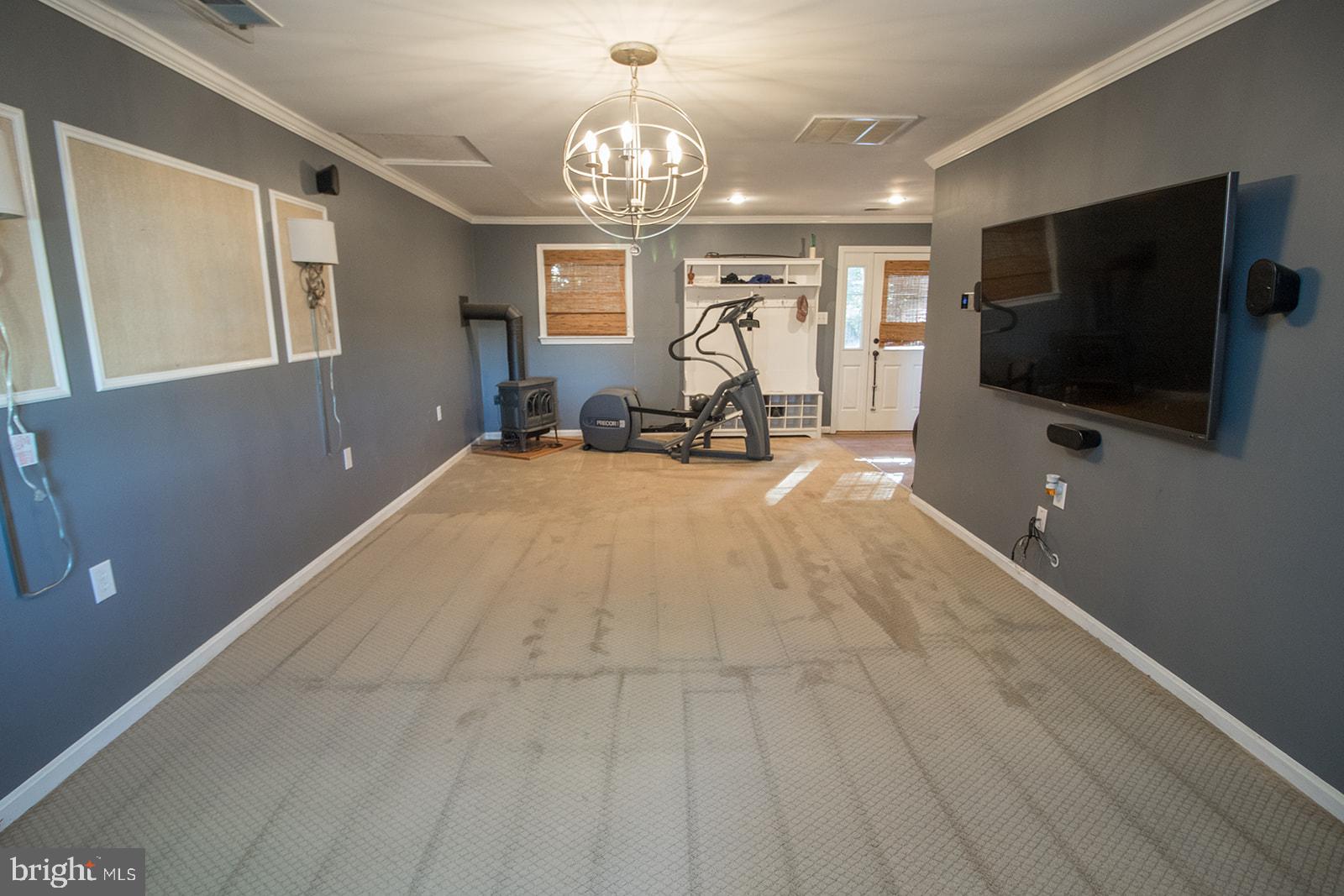 8120 Chapel Point Road Port Tobacco, MD 20677 - Photo 29 of 95 a view of a livingroom with wooden floor and furniture