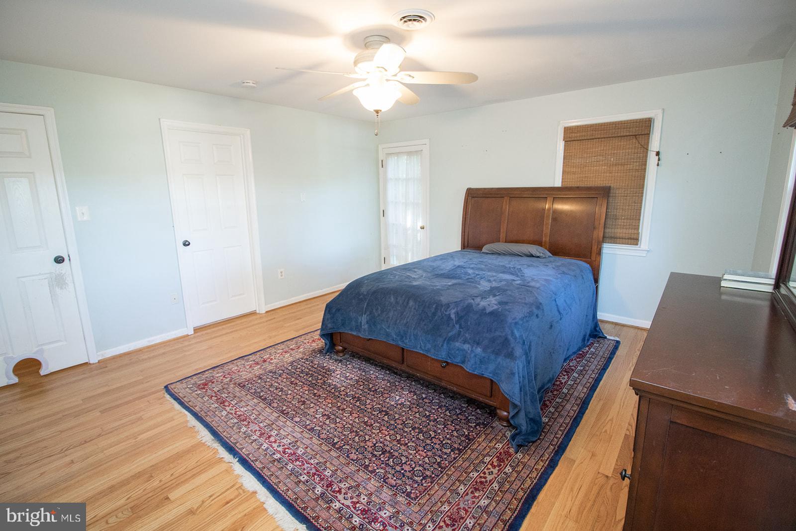 8120 Chapel Point Road Port Tobacco, MD 20677 - Photo 39 of 95 a bedroom with a bed and window
