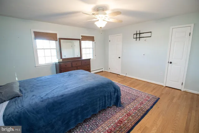 a view of a chairs and table on the balcony