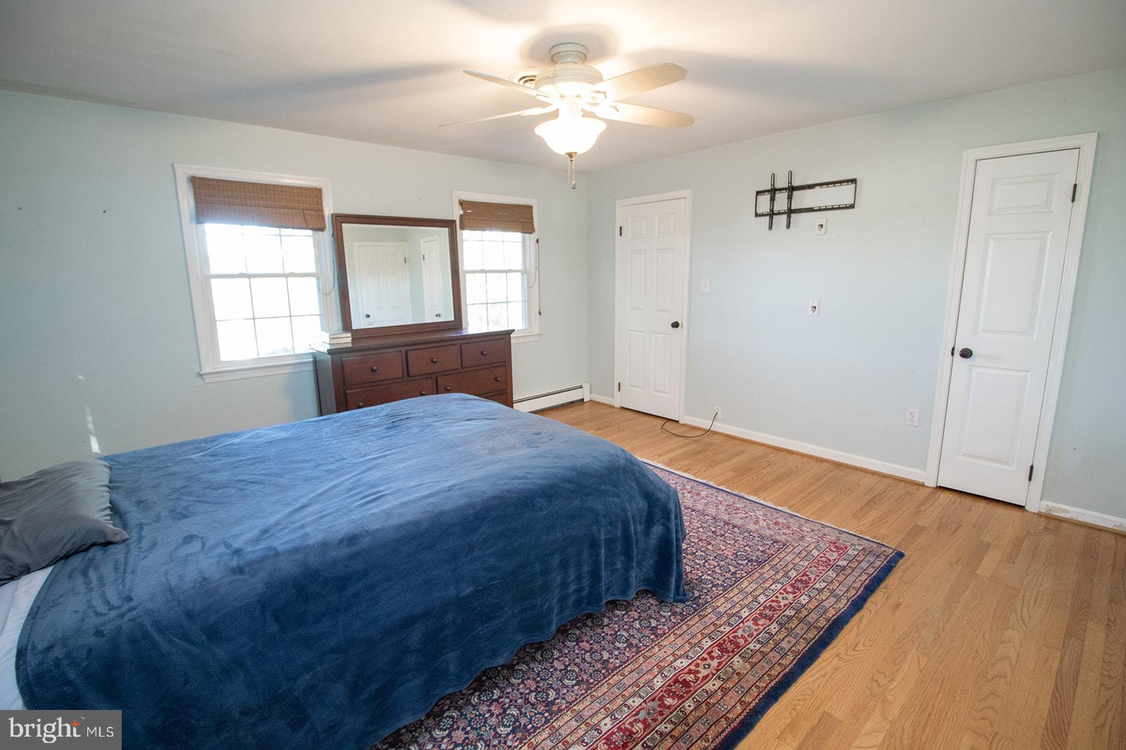 8120 Chapel Point Road Port Tobacco, MD 20677 - Photo 42 of 95 a bedroom with bed and window