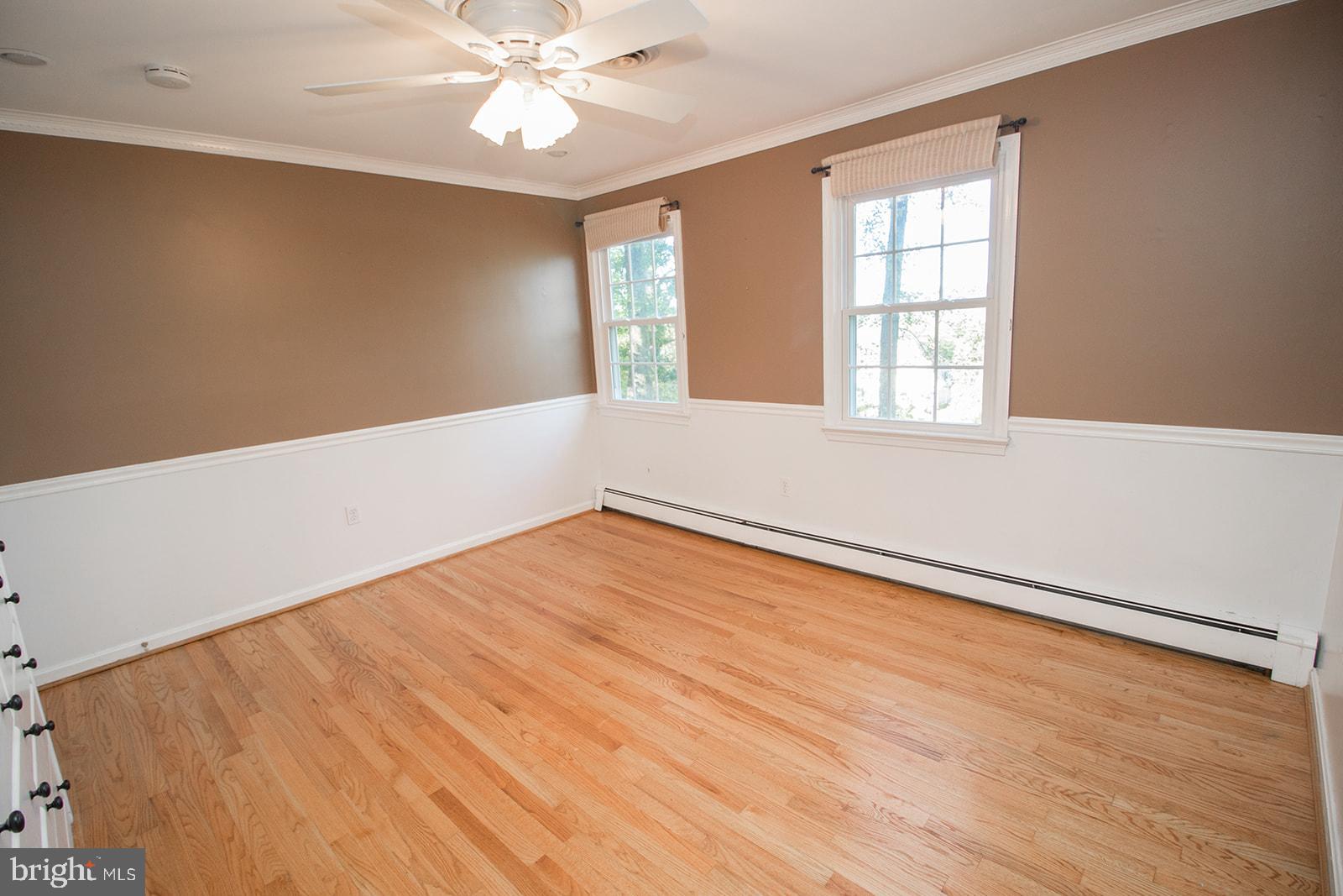 8120 Chapel Point Road Port Tobacco, MD 20677 - Photo 47 of 95 wooden floor in an empty room with a window