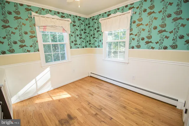 a view of a back yard of the house and green space