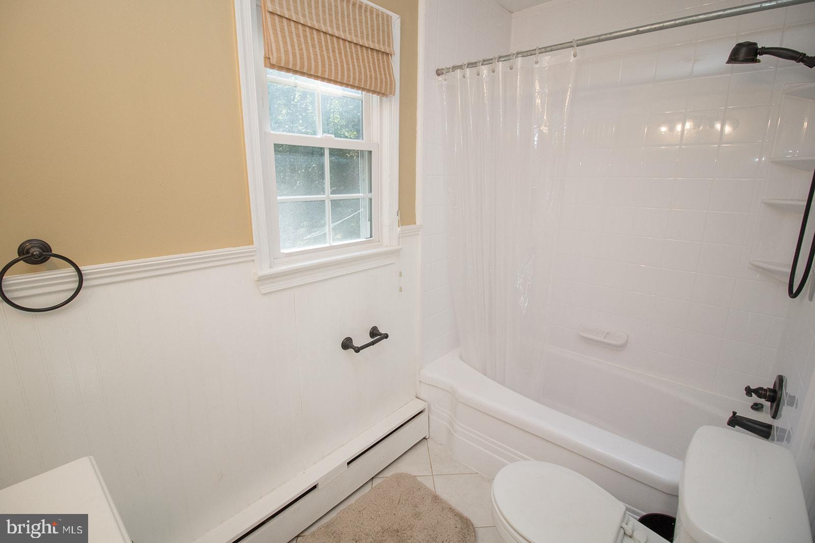 8120 Chapel Point Road Port Tobacco, MD 20677 - Photo 54 of 95 a white toilet sitting next to a bath tub