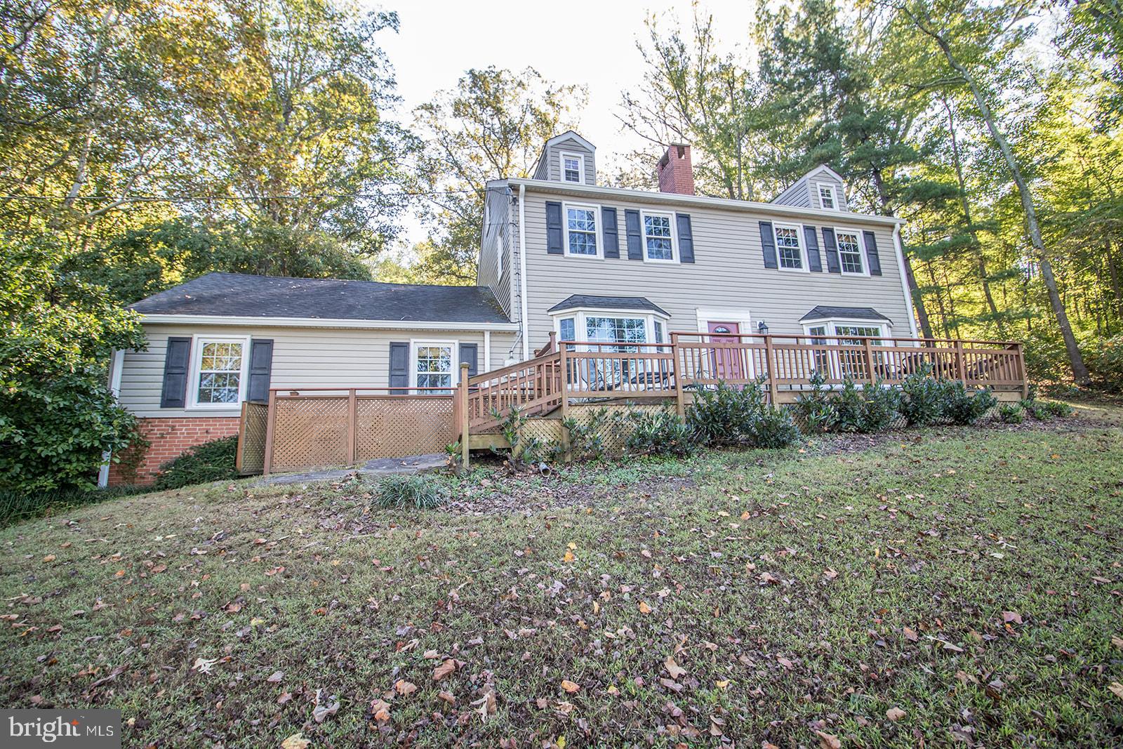 8120 Chapel Point Road Port Tobacco, MD 20677 - Photo 67 of 95 a front view of a house with a garden