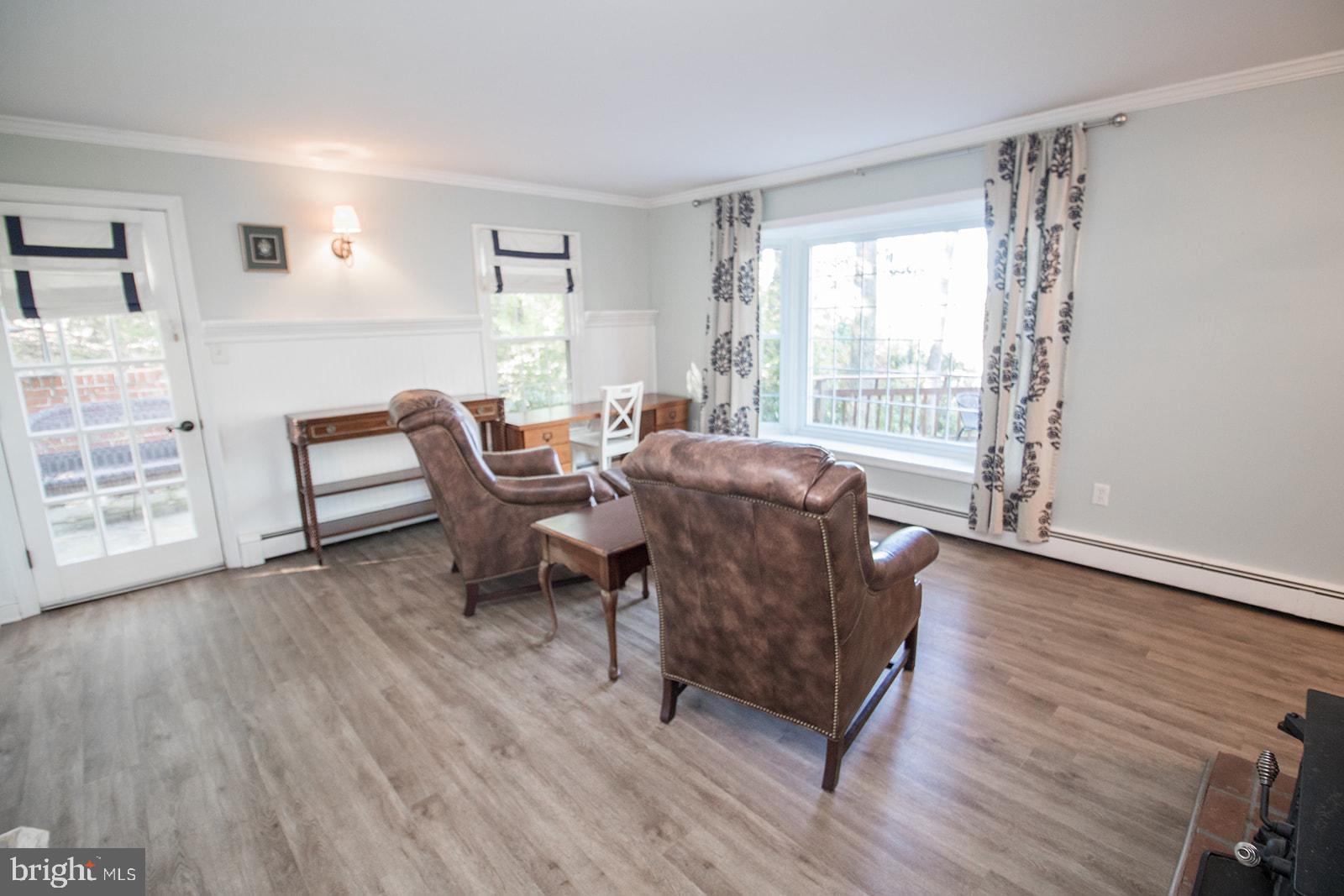8120 Chapel Point Road Port Tobacco, MD 20677 - Photo 7 of 95 a living room with furniture and wooden floor