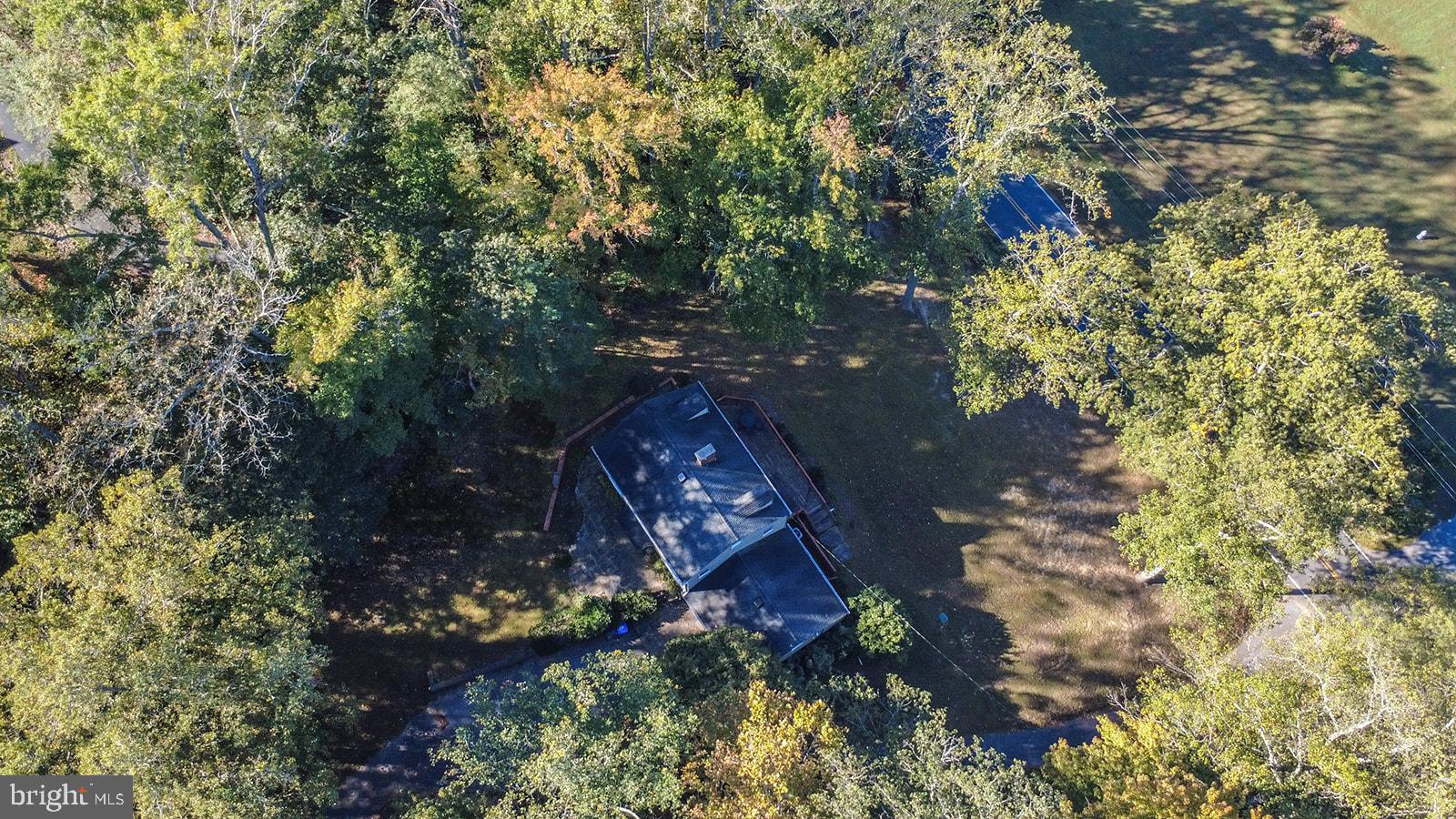 8120 Chapel Point Road Port Tobacco, MD 20677 - Photo 87 of 95 a view of a back yard of the house and green space